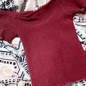 cropped shirt. Off the shoulders